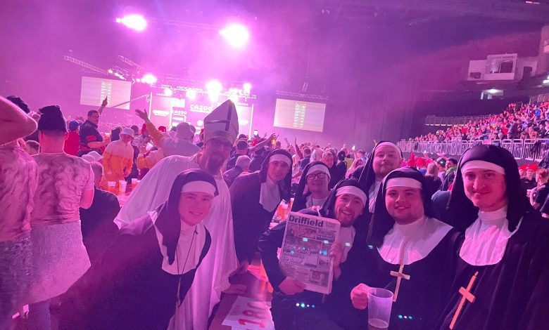 Nuns having fun at the darts in Berlin - The Wolds Weekly Newspaper